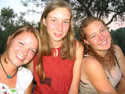 Outdoor photo of three female students